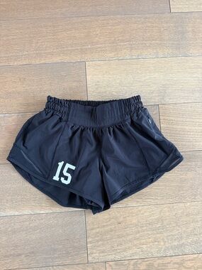Lululemon hotty hot low rise Black Shorts with Number 15 Sz 2